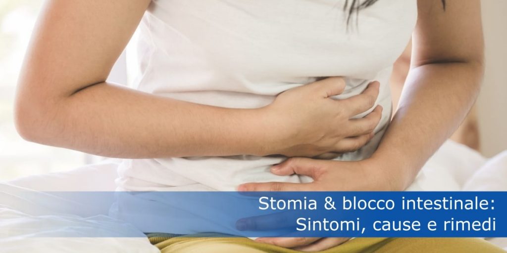 Italian woman holding her sore belly as a sign of stoma blockage